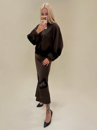 Elegantiškas dviejų dalių kostiumėlis